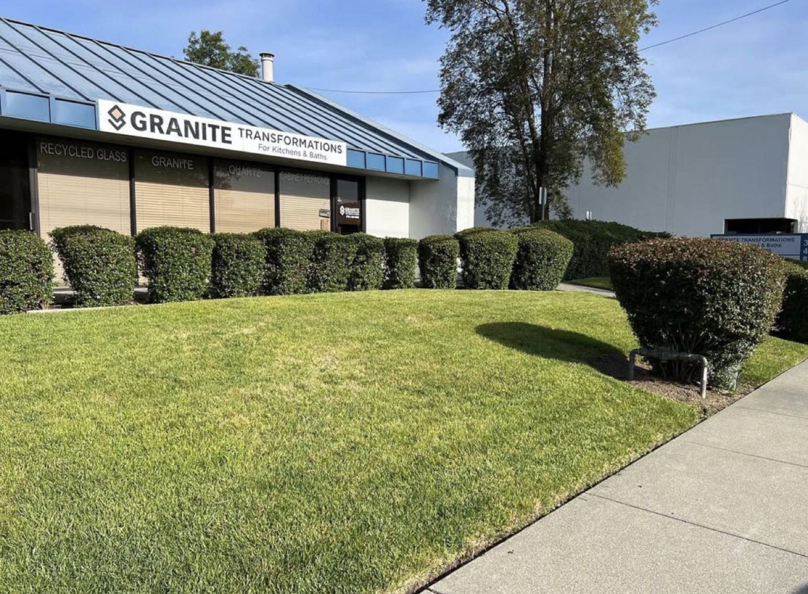 Commercial lawn and precisely trimmed hedges